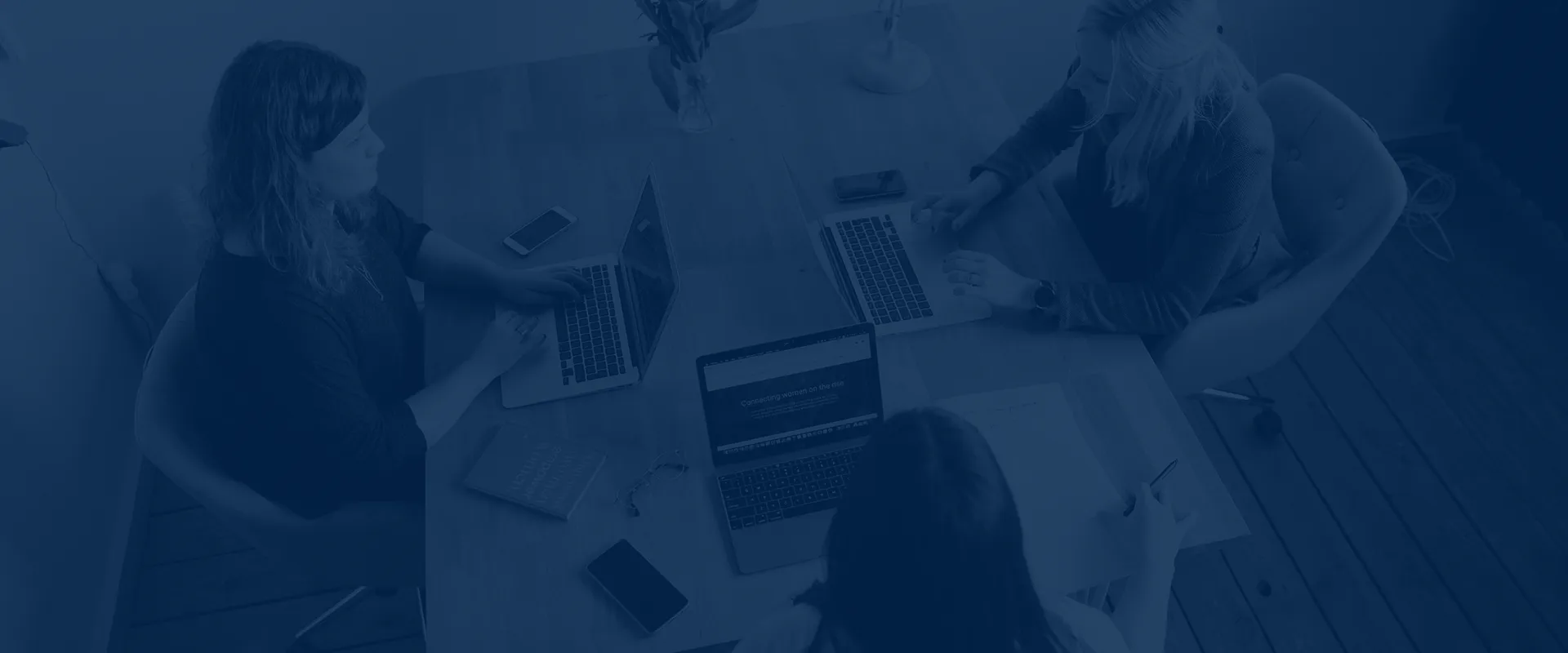 Women in a meeting about Buying a Business in Melbourne